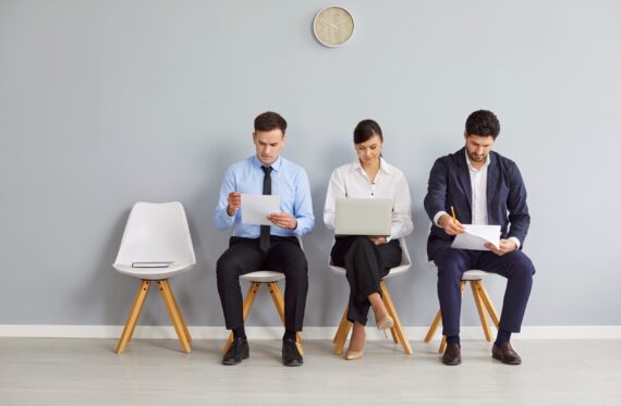 Group,Of,Male,And,Female,Job,Seekers,Sitting,In,Row